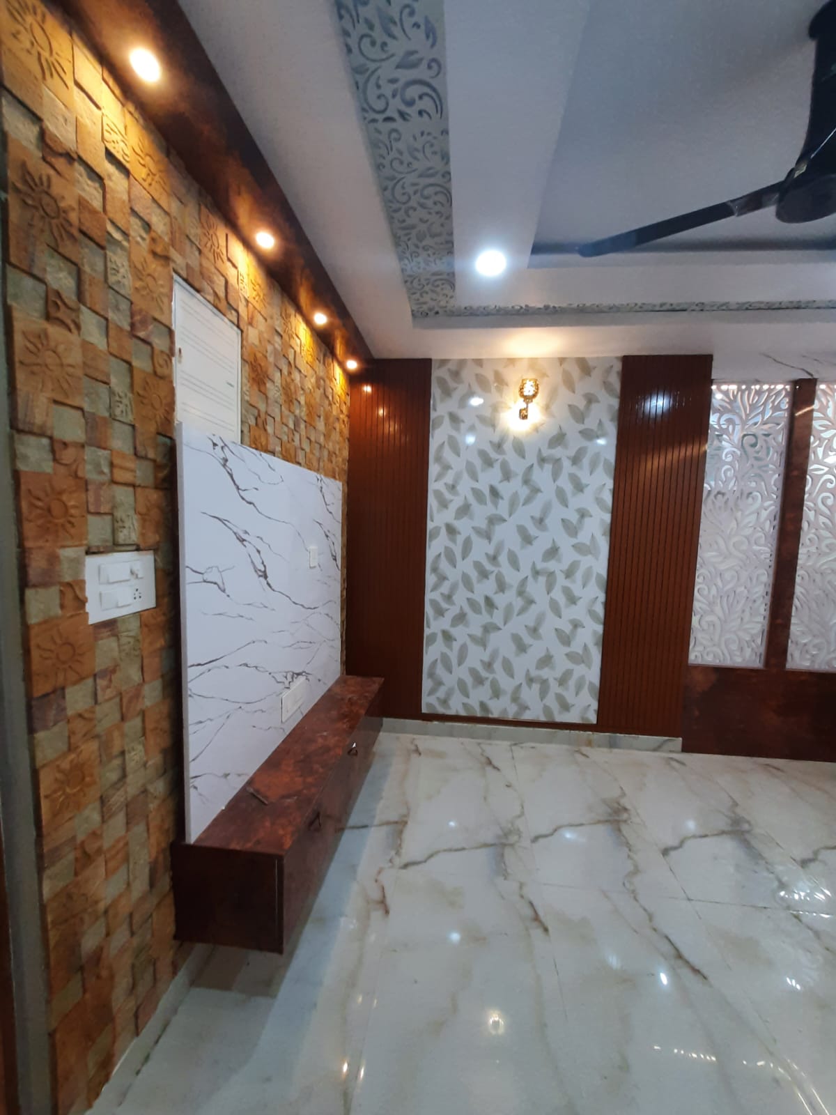 Stone cladding foyer with CNC pillars in Vizag